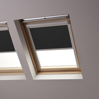 Grey Solar skylight blind in roof window